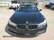 2016 BMW 7 Series 740i с VIN WBA7E2C57GG738668, выставлен на аукционе Copart как лот 61961205 с пробегом 136 808 миль миль и Списание • Salvage title. История ставок и продаж доступна на DreamBid. Изображение 5.