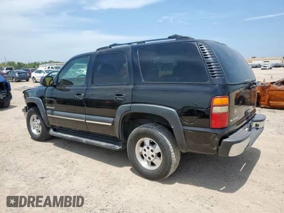 2002 Chevrolet Tahoe LT with VIN 1GNEC13Z72R218391, listed as a Copart auction lot 66496225 with 211,498 mi miles and Salvage title. Bid and sale history available at DreamBid. Image 2.
