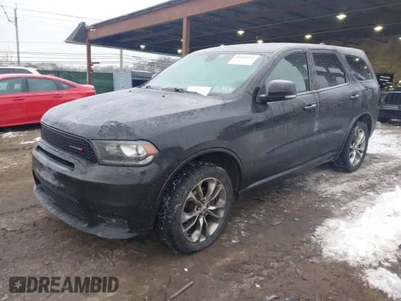 2020 Dodge Durango GT with VIN 1C4RDJDG2LC213530, listed as a IAAI auction lot 41555712 with 115,477 mi miles and . Bid and sale history available at DreamBid. Image 2.