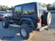 1997 Jeep Wrangler Sahara with VIN 1J4FY49SXVP486730, listed as a Copart auction lot 82473255 with 143,015 mi miles and Salvage title. Bid and sale history available at DreamBid. Image 2.