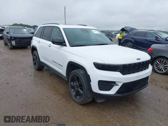 2023 Jeep Grand Cherokee Altitude with VIN 1C4RJGAG0PC610160, listed as a IAAI auction lot 42720286 with 30,456 mi miles and . Bid and sale history available at DreamBid. Image 1.