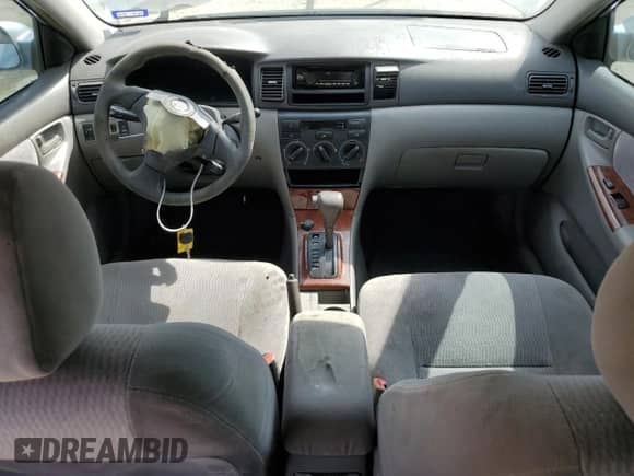 2005 Toyota Corolla LE с VIN 1NXBR32E95Z448810, выставлен на аукционе Copart как лот 87046715 с пробегом 266 757 миль миль и Списание • Salvage title. История ставок и продаж доступна на DreamBid. Изображение 8.