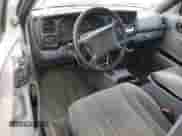 2000 Dodge Dakota Sport with VIN 1B7GG22N1YS526748, listed as a Copart auction lot 56950135 with 144,702 mi miles and Salvage title. Bid and sale history available at DreamBid. Image 8.