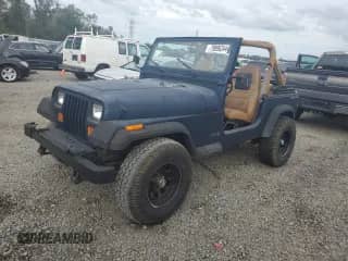 1987 Jeep Wrangler with VIN 2BCCV81J7HB521779, listed as a Copart auction lot 79896344 with 191,011 mi miles and Salvage title. Bid and sale history available at DreamBid. Image 1.