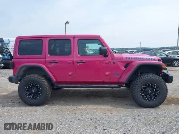 2022 Jeep Wrangler Unlimited Rubicon with VIN 1C4JJXR69NW125567, listed as a IAAI auction lot 42877525 with 28,098 mi miles and . Bid and sale history available at DreamBid. Image 13.