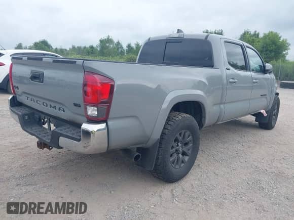 2021 Toyota Tacoma SR5 z VIN 3TMDZ5BN7MM106221, wystawiony jako IAAI lot #42827931 z przebiegiem 71 851 mil mil oraz . Historia ofert i sprzedaży dostępna na DreamBid. Obrazek 4.