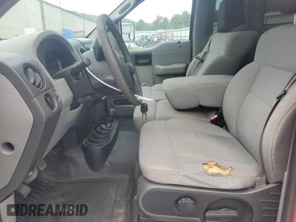 2008 Ford F-150 XL with VIN 1FTRF14W28KD96619, listed as a Copart auction lot 68909995 with 158,928 mi miles and Salvage title. Bid and sale history available at DreamBid. Image 7.
