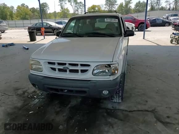 1999 Ford Explorer XL with VIN 1FMZU32X5XZB11796, listed as a Copart auction lot 81100145 with 260,195 mi miles and Salvage title. Bid and sale history available at DreamBid. Image 13.
