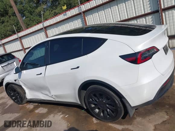 2022 Tesla Model Y Long Range z VIN 7SAYGDEE1NA003346, wystawiony jako IAAI lot #42966899 z przebiegiem 86 422 mil mil oraz . Historia ofert i sprzedaży dostępna na DreamBid. Obrazek 14.