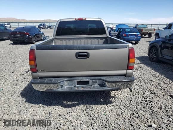 2002 Chevrolet Silverado 1500 LS with VIN 2GCEC19W621205419, listed as a Copart auction lot 68304165 with 140,481 mi miles and Salvage title. Bid and sale history available at DreamBid. Image 6.