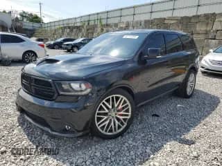 2015 Dodge Durango R/T with VIN 1C4SDJCTXFC786745, listed as a Copart auction lot 65772265 with 163,731 mi miles and Salvage title. Bid and sale history available at DreamBid. Image 1.