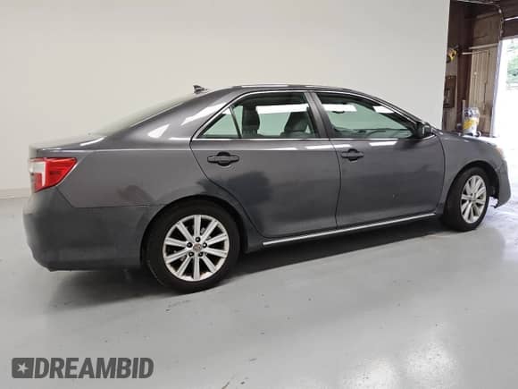 2014 Toyota Camry SE with VIN 4T1BK1FK8EU546316, listed as a Copart auction lot 69465015 with 264,332 mi miles and Clean title. Bid and sale history available at DreamBid. Image 3.