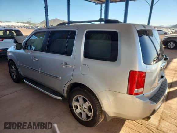 2009 Honda Pilot Touring with VIN 5FNYF48889B042501, listed as a Copart auction lot 82244955 with 187,616 mi miles and Salvage title. Bid and sale history available at DreamBid. Image 2.
