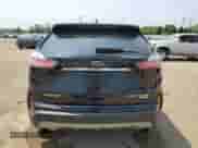 2019 Ford Edge Titanium with VIN 2FMPK3K99KBB40549, listed as a Copart auction lot 59323215 with 94,407 mi miles and Salvage title. Bid and sale history available at DreamBid. Image 6.