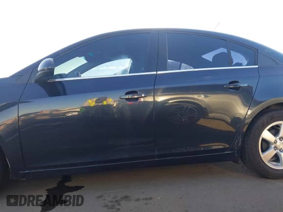 2014 Chevrolet Cruze 1LT z VIN 1G1PC5SB0E7306270, wystawiony jako IAAI lot #43335671 z przebiegiem 125 429 mil mil oraz . Historia ofert i sprzedaży dostępna na DreamBid. Obrazek 15.