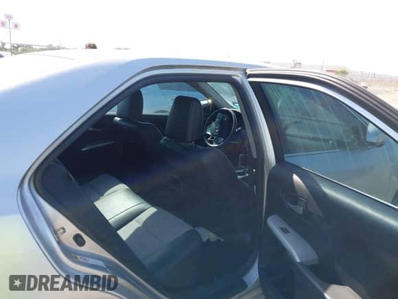 2014 Toyota Camry L with VIN 4T1BF1FK5EU373973, listed as a IAAI auction lot 43008960 with 184,232 mi miles and . Bid and sale history available at DreamBid. Image 8.