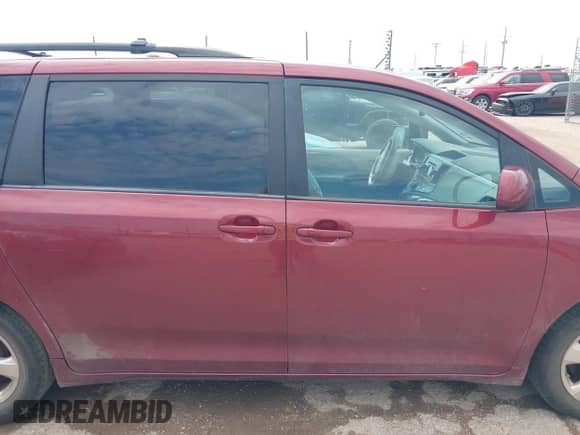 2014 Toyota Sienna LE AAS with VIN 5TDKK3DC2ES491717, listed as a IAAI auction lot 43056857 with 214,762 mi miles and . Bid and sale history available at DreamBid. Image 13.