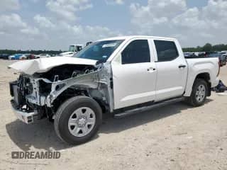 2025 Toyota Tundra SR with VIN 5TFKB5AB0SX046521, listed as a Copart auction lot 63084955 with 5,558 mi miles and Salvage title. Bid and sale history available at DreamBid. Image 1.