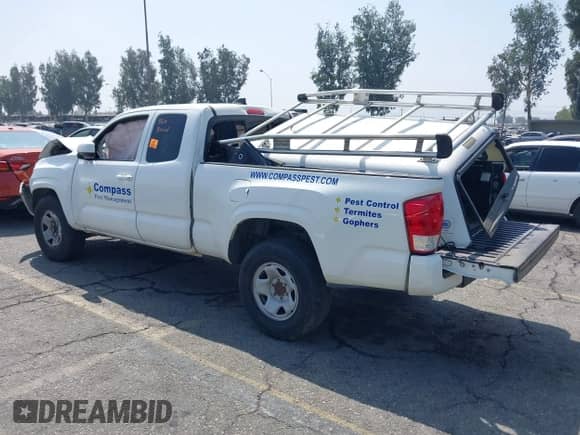 2020 Toyota Tacoma SR with VIN 3TYRX5GN2LT001173, listed as a IAAI auction lot 42956322 with 119,729 mi miles and . Bid and sale history available at DreamBid. Image 3.