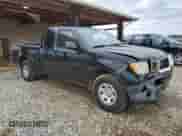 2017 Nissan Frontier S with VIN 1N6BD0CT2HN701735, listed as a Copart auction lot 56777005 with 196,980 mi miles and Salvage title. Bid and sale history available at DreamBid. Image 4.