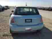 2011 MINI Hardtop with VIN WMWSU3C52BT253034, listed as a Copart auction lot 90109305 with 50,636 mi miles and Salvage title. Bid and sale history available at DreamBid. Image 6.