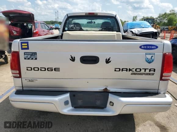 2003 Dodge Dakota с VIN 1D7FL36X53S296882, выставлен на аукционе Copart как лот 61539595 с пробегом 146 601 миль миль и Списание • Salvage title. История ставок и продаж доступна на DreamBid. Изображение 6.