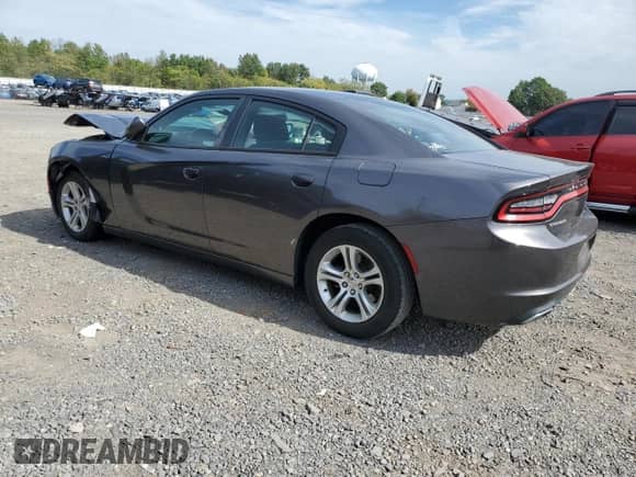 2015 Dodge Charger SE with VIN 2C3CDXBG6FH847974, listed as a Copart auction lot 84206385 with 107,282 mi miles and Salvage title. Bid and sale history available at DreamBid. Image 2.
