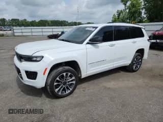 2021 Jeep Grand Cherokee Overland with VIN 1C4RJKDG5M8129138, listed as a Copart auction lot 60733455 with 57,027 mi miles and Salvage title. Bid and sale history available at DreamBid. Image 1.