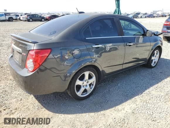 2016 Chevrolet Sonic LTZ with VIN 1G1JE5SB0G4146802, listed as a Copart auction lot 80408445 with 121,743 mi miles and Salvage title. Bid and sale history available at DreamBid. Image 3.