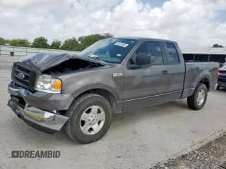 2005 Ford F-150 STX с VIN 1FTRX02W15KB90827, выставлен на аукционе Copart как лот 60733685 с пробегом 212 415 миль миль и Списание • Salvage title. История ставок и продаж доступна на DreamBid. Изображение 1.
