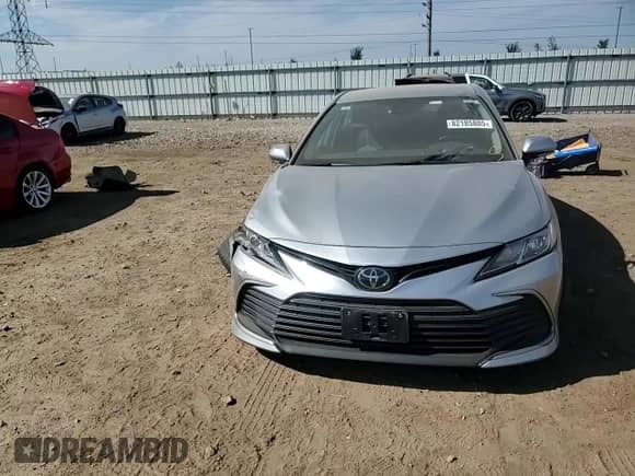 2021 Toyota Camry LE z VIN 4T1R11AK8MU455540, wystawiony jako Copart lot #82185805 z przebiegiem 16 292 mil mil oraz Szkoda całkowita • Salvage title. Historia ofert i sprzedaży dostępna na DreamBid. Obrazek 13.