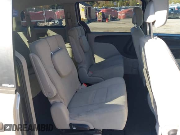 2014 Dodge Grand Caravan SE z VIN 2C4RDGBG2ER106719, wystawiony jako IAAI lot #43560873 z przebiegiem 183 833 mil mil oraz . Historia ofert i sprzedaży dostępna na DreamBid. Obrazek 8.