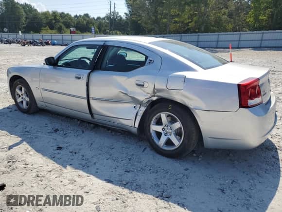 2010 Dodge Charger SXT с VIN 2B3CA3CV8AH237529, выставлен на аукционе Copart как лот 69405074 с пробегом 241 942 миль миль и Списание • Salvage title. История ставок и продаж доступна на DreamBid. Изображение 2.