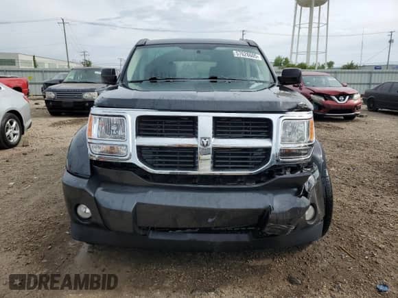 2010 Dodge Nitro SE with VIN 1D4PT2GK1AW134610, listed as a Copart auction lot 57628605 with 89,948 mi miles and Salvage title. Bid and sale history available at DreamBid. Image 5.