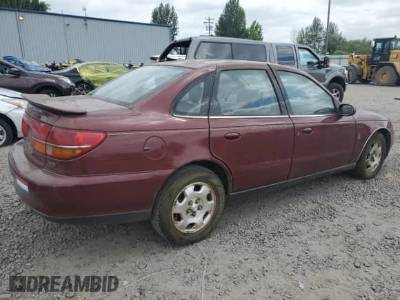 2001 Saturn LS z VIN 1G8JW54R81Y589692, wystawiony jako Copart lot #60533805 z przebiegiem 167 342 mil mil oraz Czysty tytuł • Clean title. Historia ofert i sprzedaży dostępna na DreamBid. Obrazek 3.