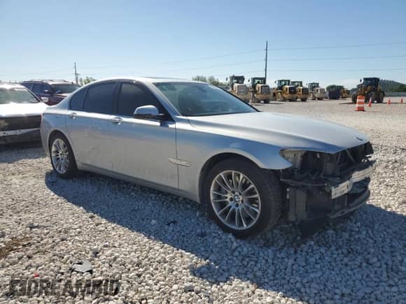 2013 BMW 7 Series 750i with VIN WBAYA8C54DC996698, listed as a Copart auction lot 53235915 with 116,247 mi miles and Salvage title. Bid and sale history available at DreamBid. Image 4.