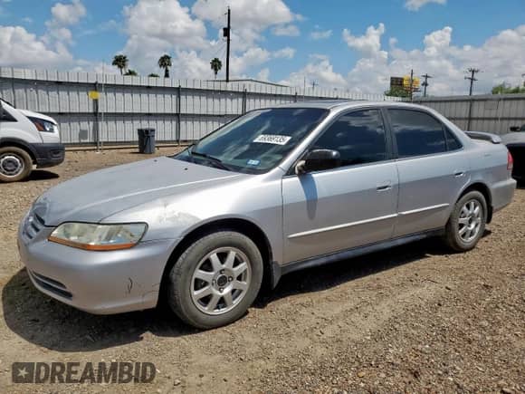 2002 Honda Accord SE z VIN JHMCG56742C026112, wystawiony jako Copart lot #69369135 z przebiegiem Nie podano mil oraz Szkoda całkowita • Salvage title. Historia ofert i sprzedaży dostępna na DreamBid. Obrazek 1.