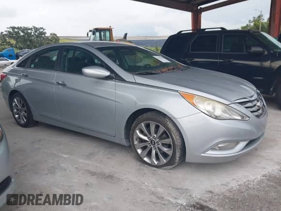 2011 Hyundai Sonata SE z VIN 5NPEC4AC4BH060236, wystawiony jako IAAI lot #43193376 z przebiegiem 87 918 mil mil oraz . Historia ofert i sprzedaży dostępna na DreamBid. Obrazek 1.