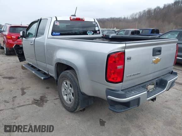 2015 Chevrolet Colorado with VIN 1GCHSAE30F1272914, listed as a IAAI auction lot 41879725 with 30,327 mi miles and . Bid and sale history available at DreamBid. Image 3.