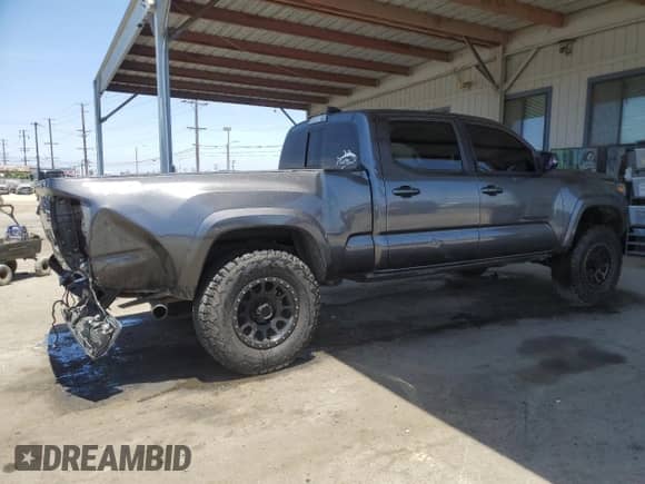 2020 Toyota Tacoma SR5 с VIN 3TMBZ5DN4LM024014, выставлен на аукционе Copart как лот 58260065 с пробегом 145 836 миль миль и Списание • Salvage title. История ставок и продаж доступна на DreamBid. Изображение 3.