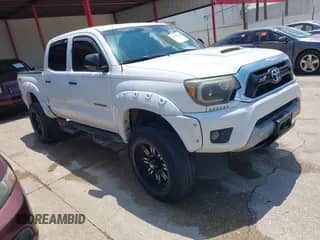2015 Toyota Tacoma PreRunner z VIN 3TMJU4GN6FM189406, wystawiony jako IAAI lot #42865904 z przebiegiem 171 853 mil mil oraz . Historia ofert i sprzedaży dostępna na DreamBid. Obrazek 1.