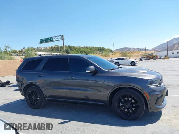 2021 Dodge Durango R/T with VIN 1C4SDJCT4MC716350, listed as a IAAI auction lot 43144527 with 52,046 mi miles and . Bid and sale history available at DreamBid. Image 14.
