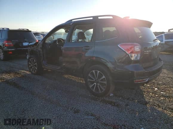 2017 Subaru Forester Touring with VIN JF2SJGWCXHH577360, listed as a Copart auction lot 86335595 with 75,471 mi miles and Salvage title. Bid and sale history available at DreamBid. Image 2.
