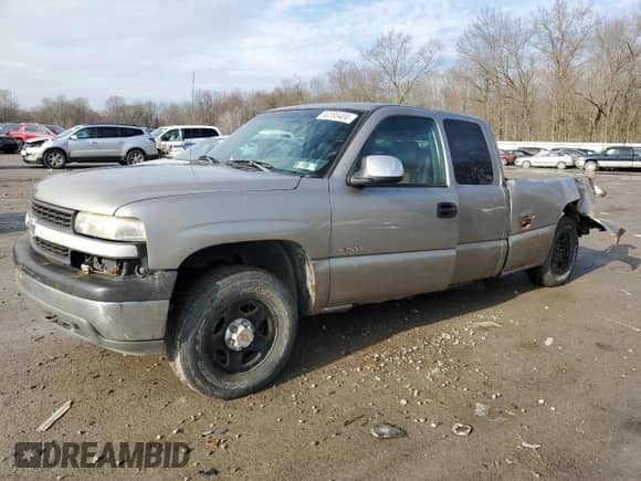 2001 Chevrolet Silverado 1500 LS z VIN 1GCEK19V21E103039, wystawiony jako Copart lot #83390404 z przebiegiem 190 176 mil mil oraz Szkoda całkowita • Salvage title. Historia ofert i sprzedaży dostępna na DreamBid. Obrazek 1.