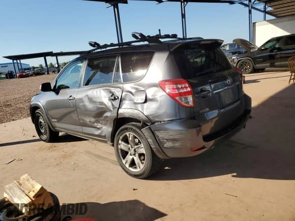 2010 Toyota RAV4 Sport with VIN JTMRF4DV3A5030651, listed as a Copart auction lot 81797365 with 200,582 mi miles and Salvage title. Bid and sale history available at DreamBid. Image 2.