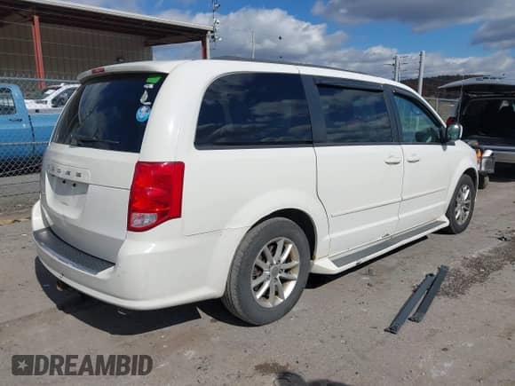 2013 Dodge Grand Caravan SXT with VIN 2C4RDGCG1DR538876, listed as a IAAI auction lot 43515161 with 208,934 mi miles and . Bid and sale history available at DreamBid. Image 4.