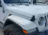 2021 Jeep Wrangler Unlimited Sahara z VIN 1C4HJXEN3MW717895, wystawiony jako IAAI lot #41472929 z przebiegiem 58 001 mil mil oraz . Historia ofert i sprzedaży dostępna na DreamBid. Obrazek 6.