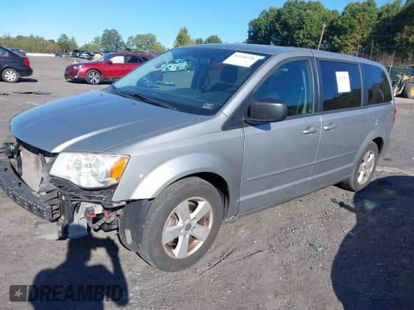 2015 Dodge Grand Caravan American Value z VIN 2C4RDGBG1FR615265, wystawiony jako IAAI lot #43330590 z przebiegiem 92 634 mil mil oraz . Historia ofert i sprzedaży dostępna na DreamBid. Obrazek 2.