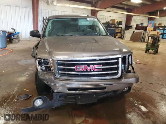 2012 GMC Sierra 1500 SLE z VIN 1GTR2VE71CZ327608, wystawiony jako Copart lot #84034025 z przebiegiem 160 939 mil mil oraz Czysty tytuł • Clean title. Historia ofert i sprzedaży dostępna na DreamBid. Obrazek 5.