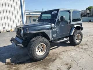 2004 Jeep Wrangler X z VIN 1J4FA39S14P767506, wystawiony jako Copart lot #81744215 z przebiegiem 147 569 mil mil oraz Szkoda całkowita • Salvage title. Historia ofert i sprzedaży dostępna na DreamBid. Obrazek 1.